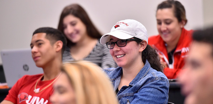 HEBSBA student smiling in UIW business class