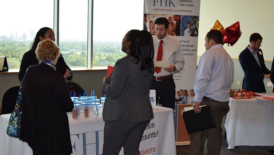 student and employer at career fair