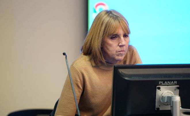Kathy Bottaro on a computer