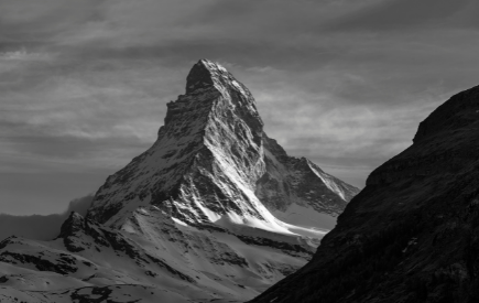 A black and white image of a mountain