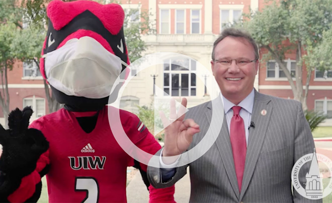 UIW President Evans and UIW Mascot Red the Cardinal