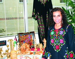   Rolla Alaydi ‘04 MEd creates a complete cultural experience for   students in her embroidery classes.