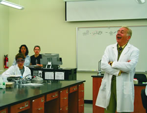 UIW President Dr. Louis J. Agnese, Jr., drops by the lab to visit with students.