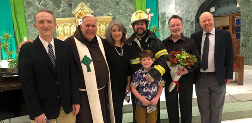 group of people gathered in a church posing