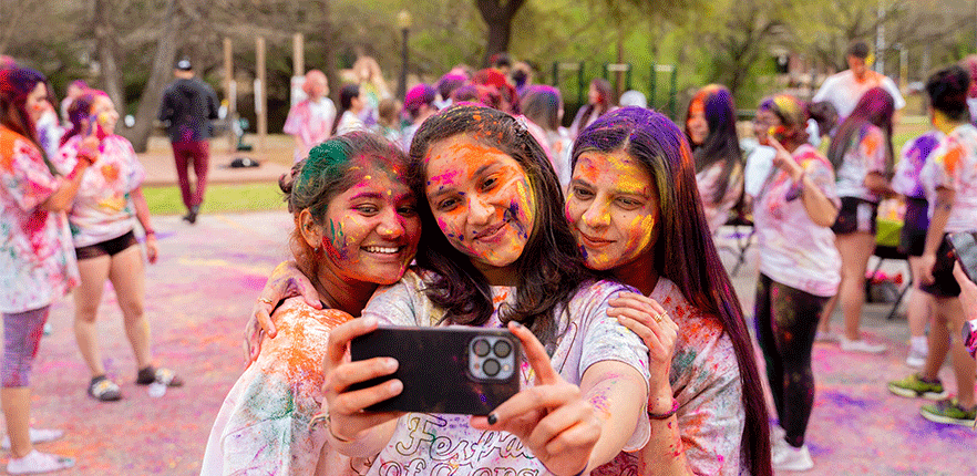 Students take a selfie together. 