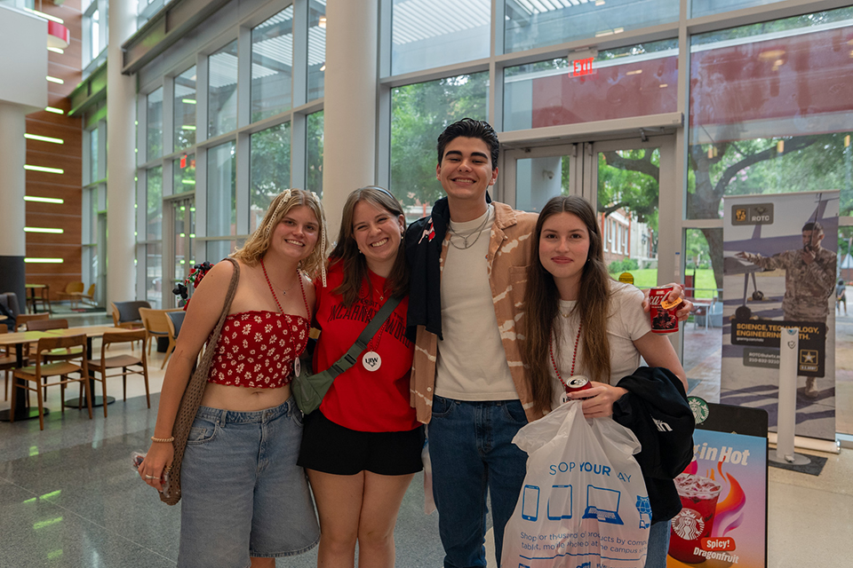 Four students in the Student Engagement Center