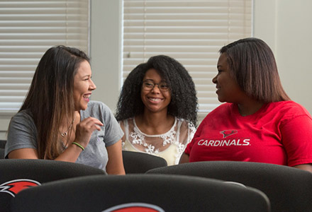 Guide talking with students