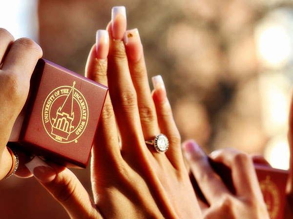 Hand with UIW ring