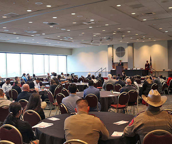 President Evans speaking at a criminal justice event presentation