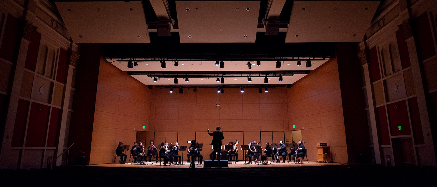 UIW Wind ensemble on stage performing