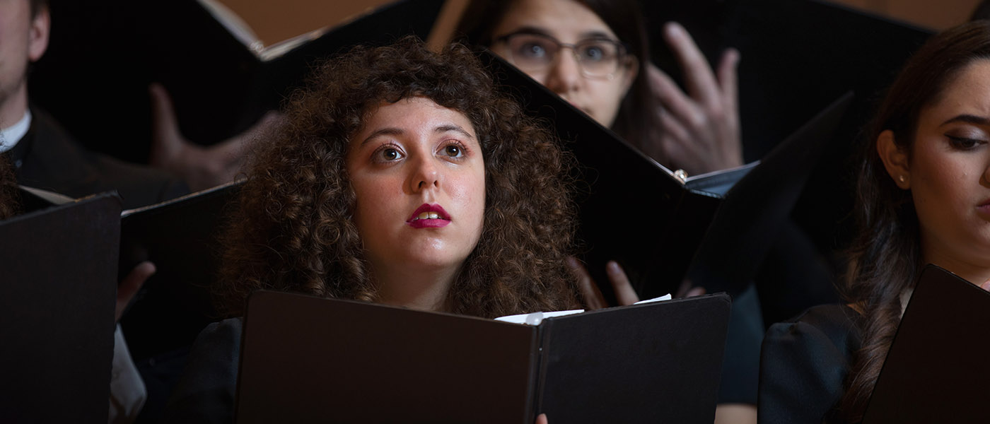 Closeup of Cardinal Singers performing on stage