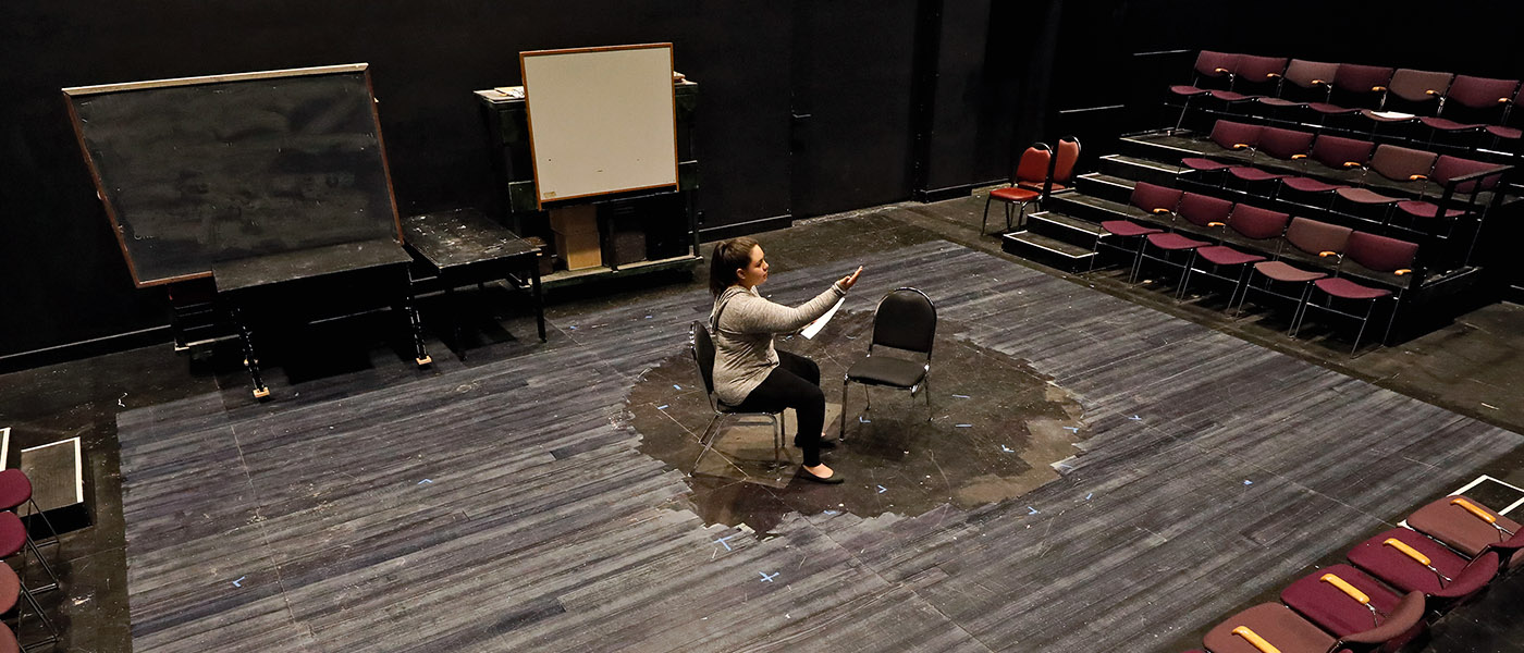 Theatre Arts student rehearsing her lines on the classroom stage