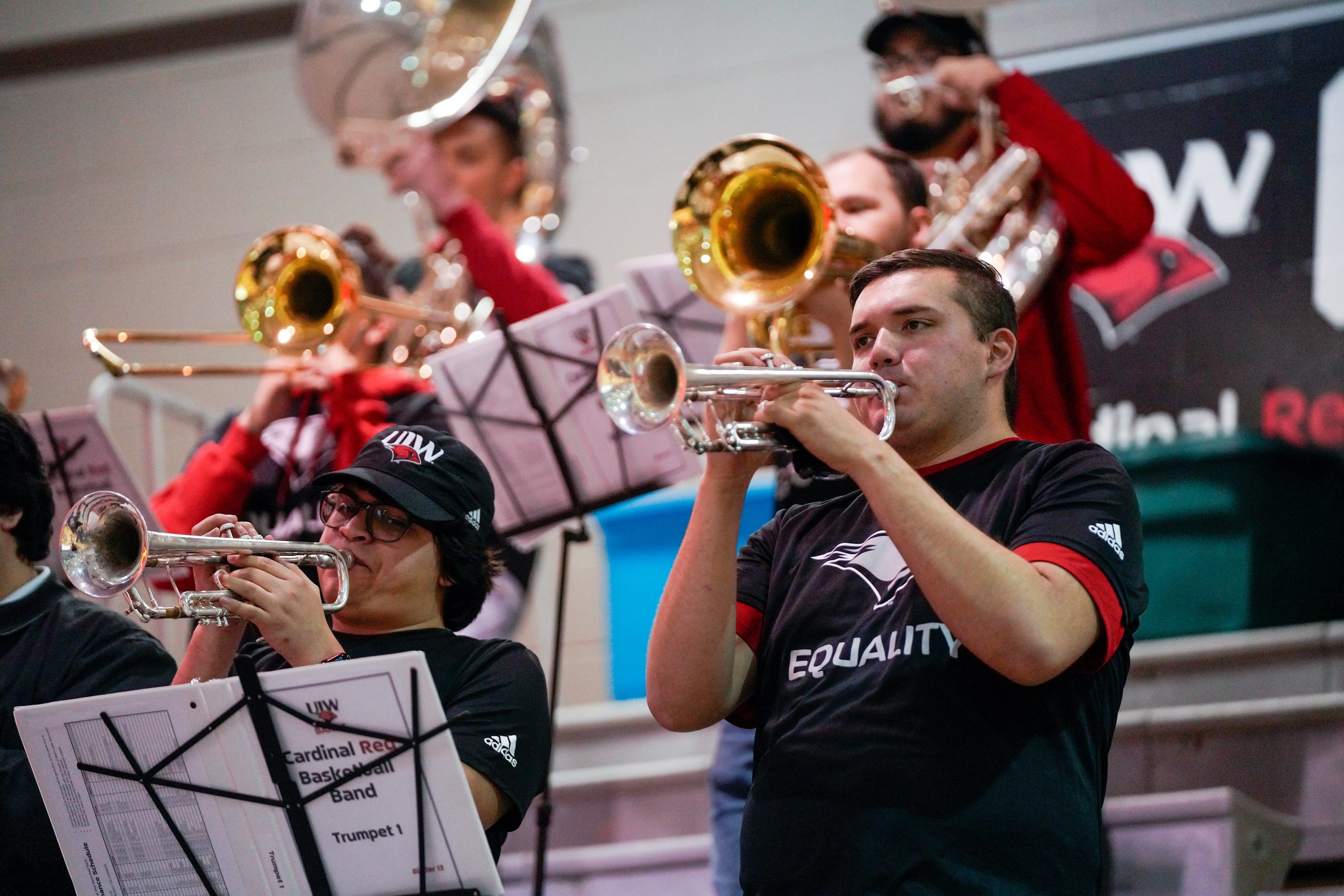 Cardinal Red Basketball Band performing at game.