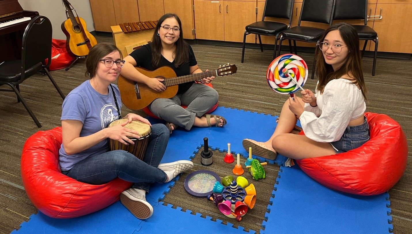 Group of Music Therapy Students around instruments for therapy