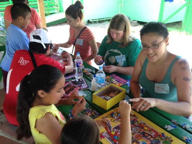 University of the Incarnate Word Student working with children at ARISE event