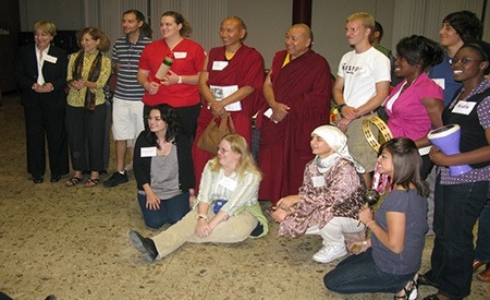 Students listening to a presentation on Buddhism