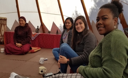 students hearing presentation on Buddhism