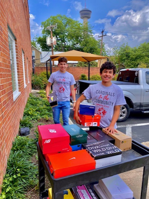 UIW Students collecting shoes