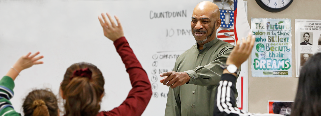 Teacher in a high school classroom