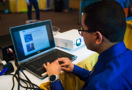 Computer Information Systems student with laptop