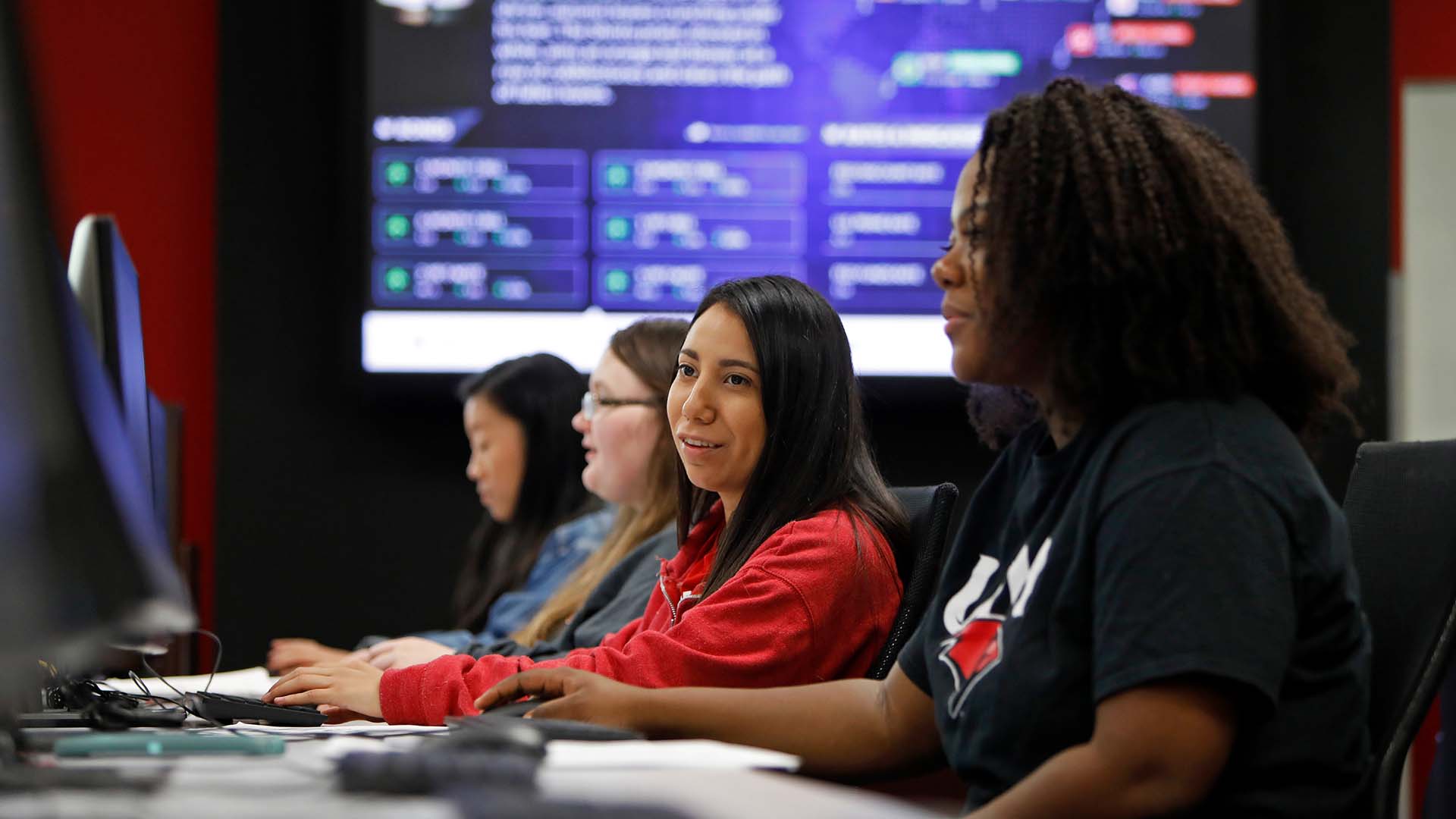 Four UIW Students working in their classroom