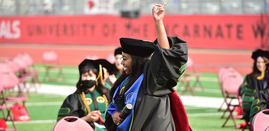 UIW 2021 Med School Graduate Pointing To The Sky