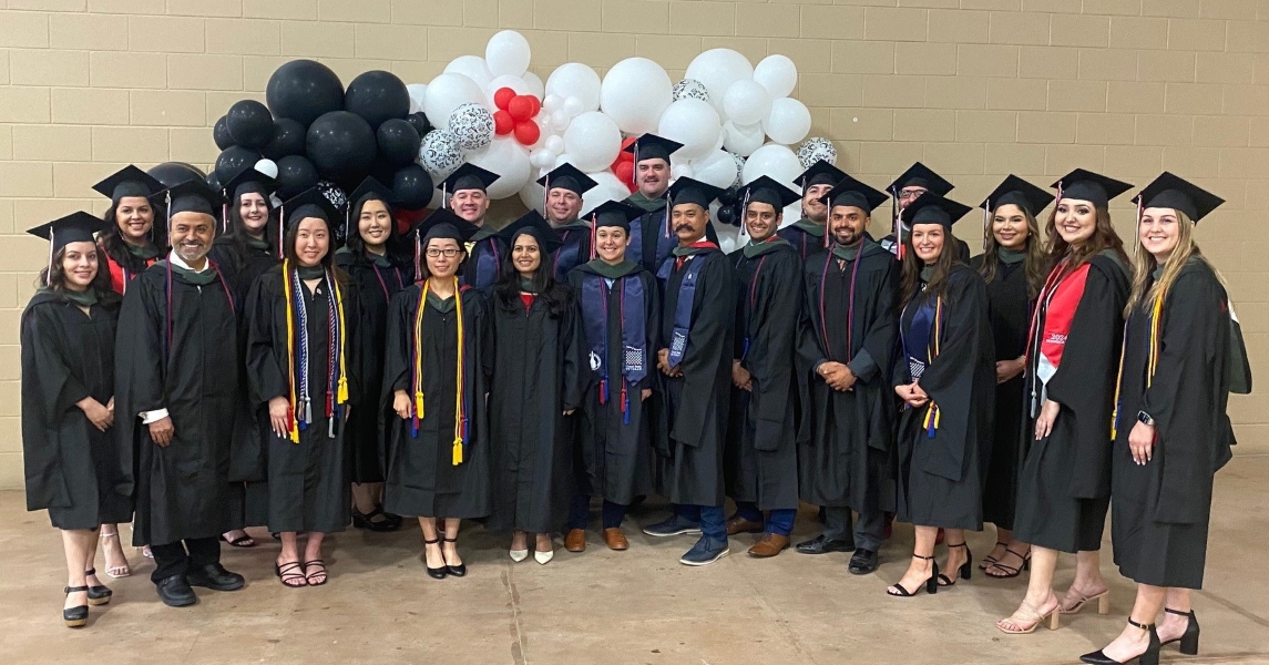 MHA Class of 2024 in Graduation Regalia