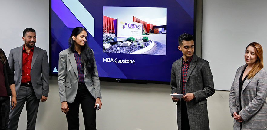 Capstone students giving a presentation