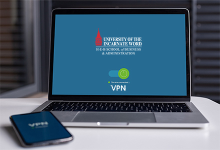 stock photo laptop with uiw logo