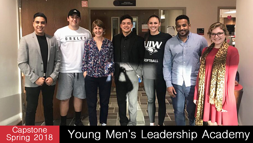 capstone students pose with ymla client