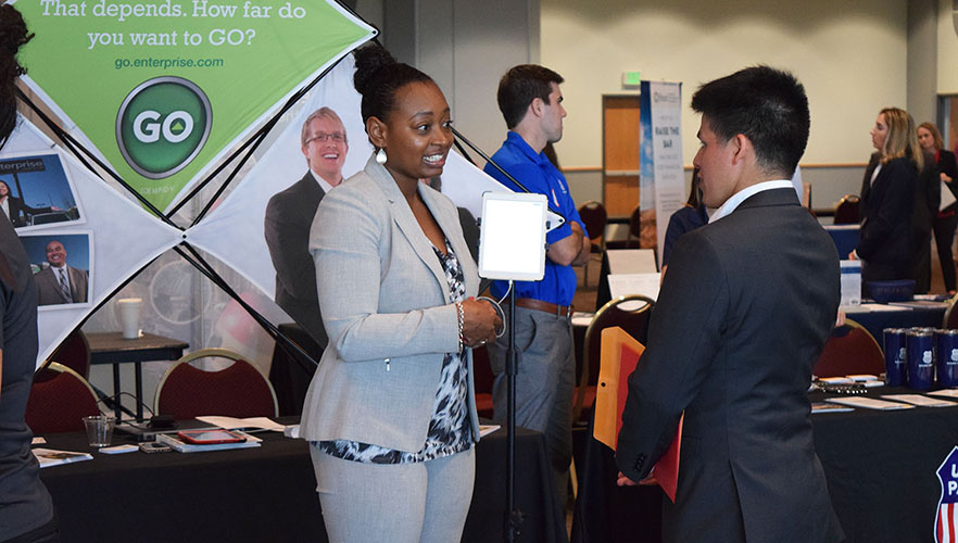 student and employer at career fair