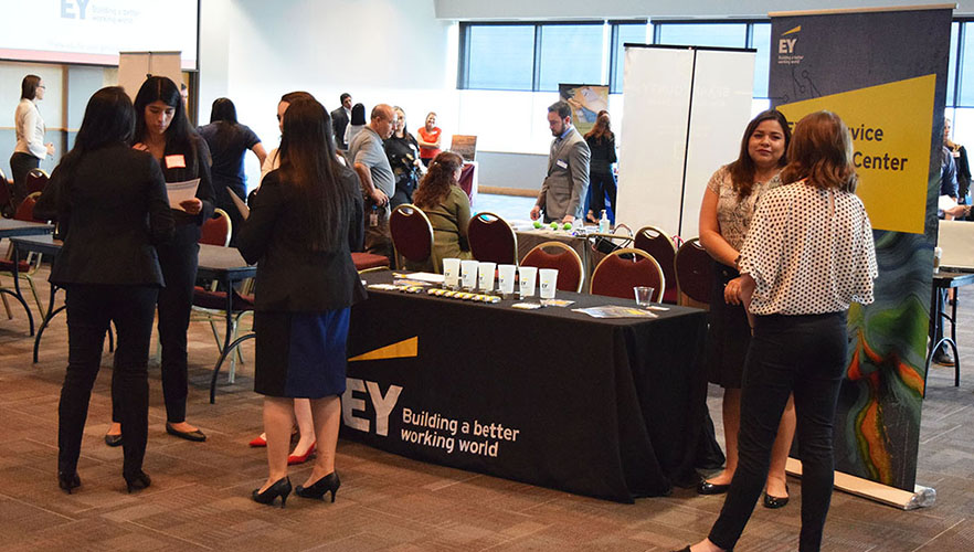 student and employer at career fair