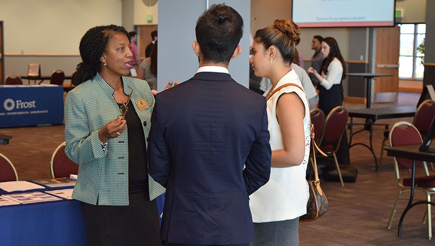 student and employer at career fair