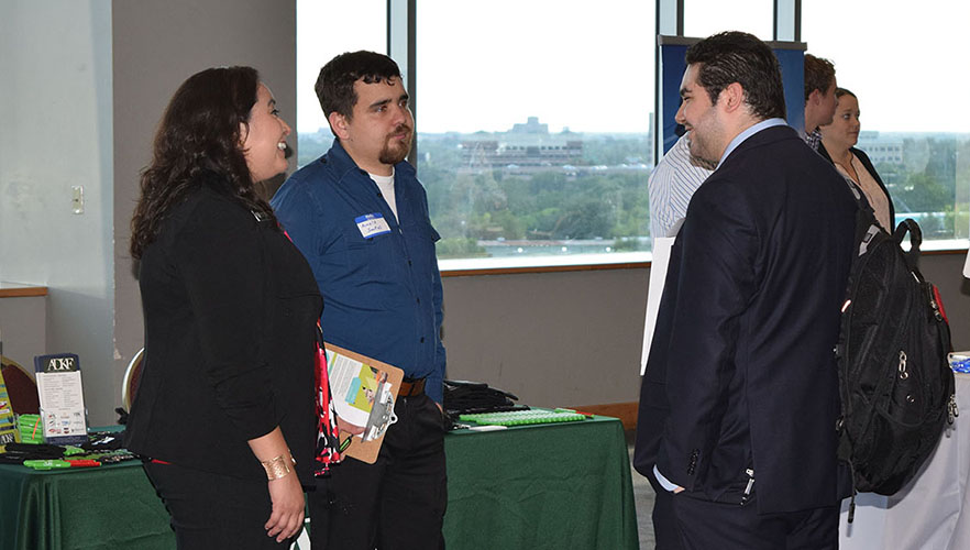 student and employer at career fair