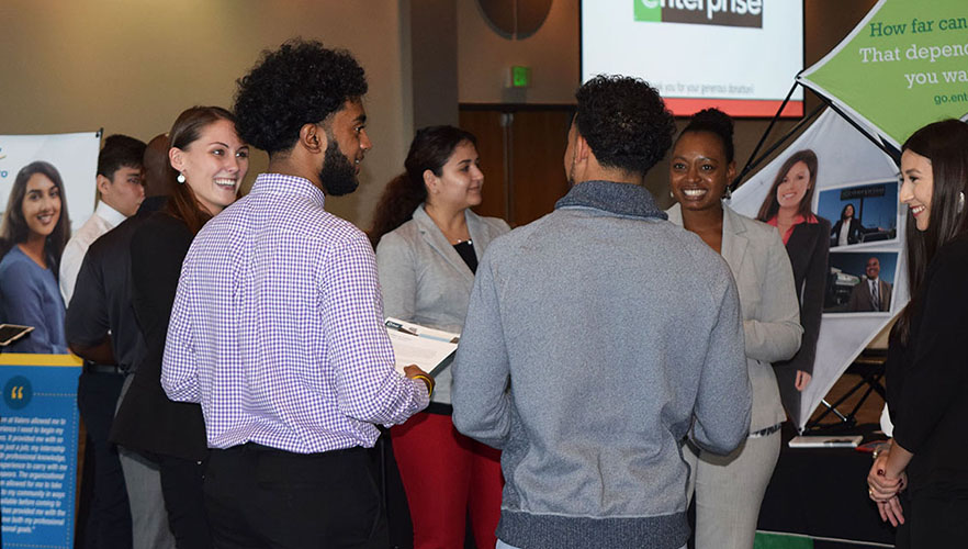 student and employer at career fair