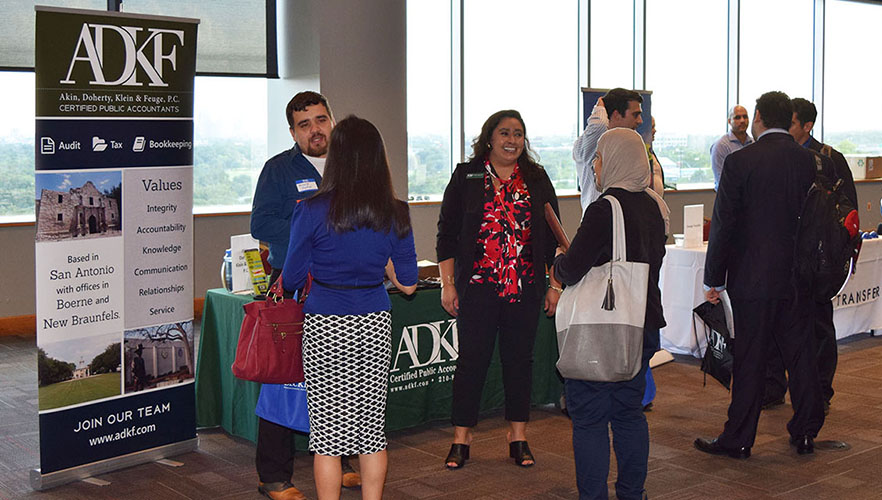 student and employer at career fair