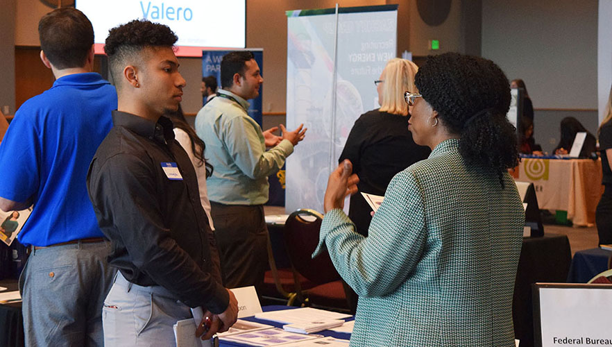 student and employer at career fair