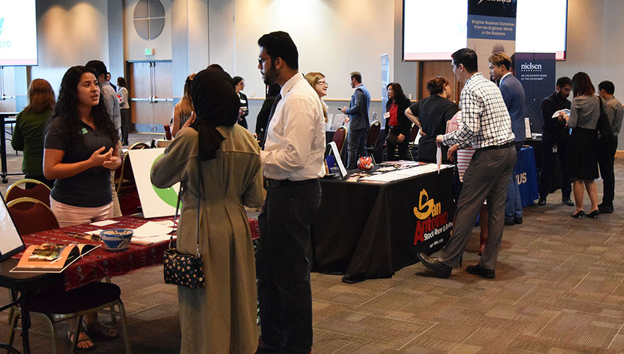 student and employer at career fair