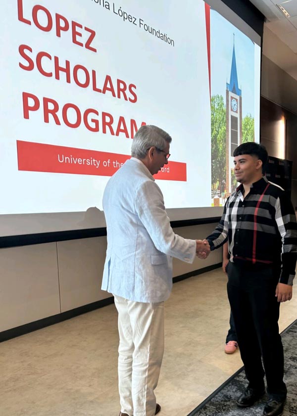 student shaking hands