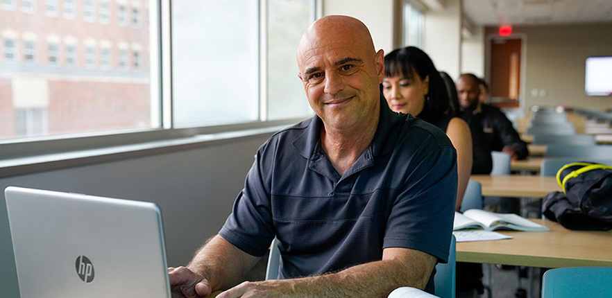 man working on laptop