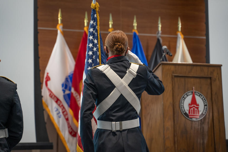 UIW Army ROTC Color Guard cadet saluting the flag