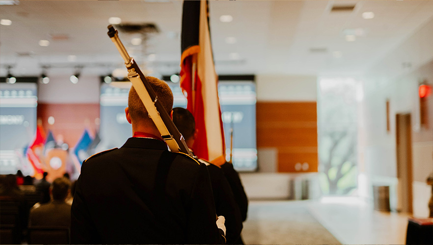 Veteran holding flag