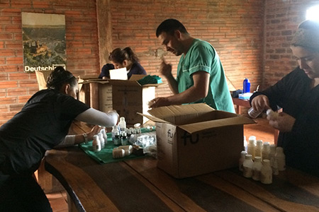 Students help to work mobile clinic in rural areas