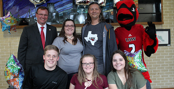 Matthew, Melanie and Madelyn Peters, L-R Back Row, Dr. Thomas Evans, Karyn Peters, Paul Harris and Red the Cardinal