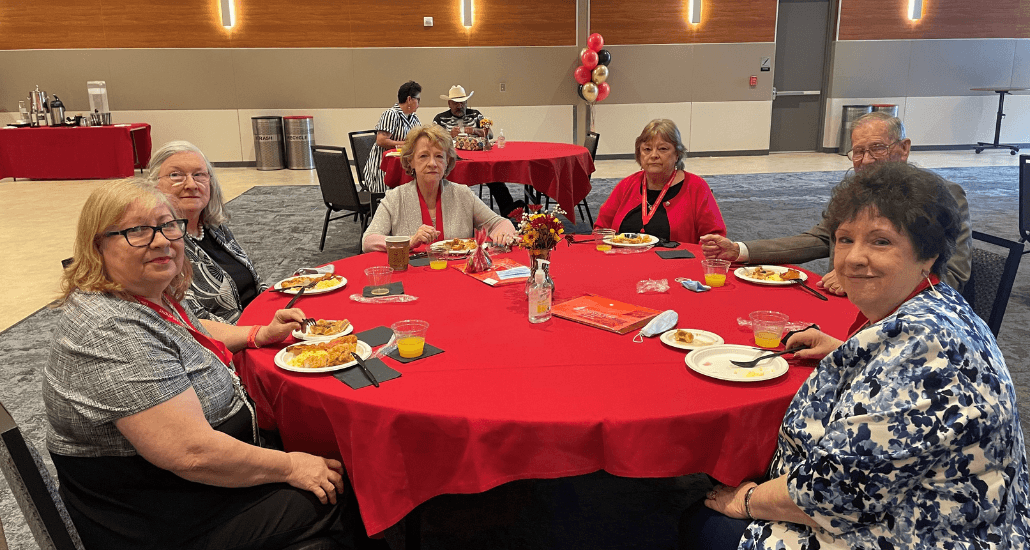 Group poses for picture at Sunday Brunch