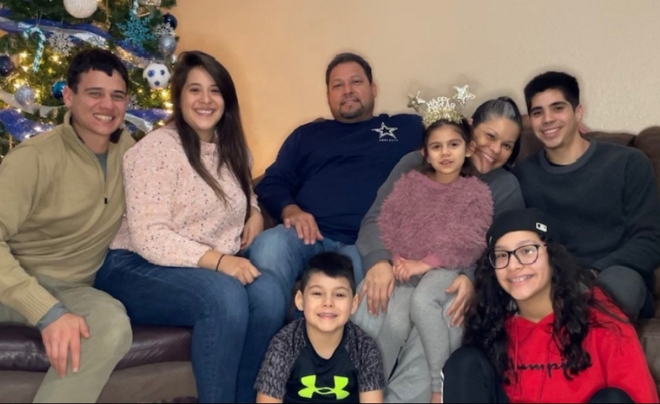 Group of family members smiling at the camera