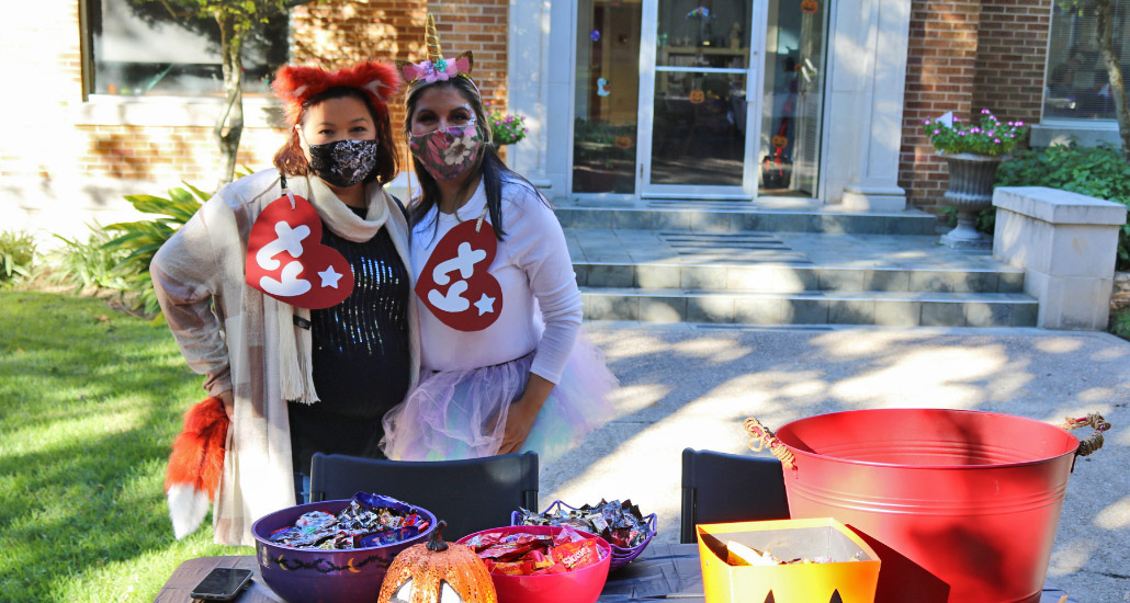 Two women dressed as TY beanie babies