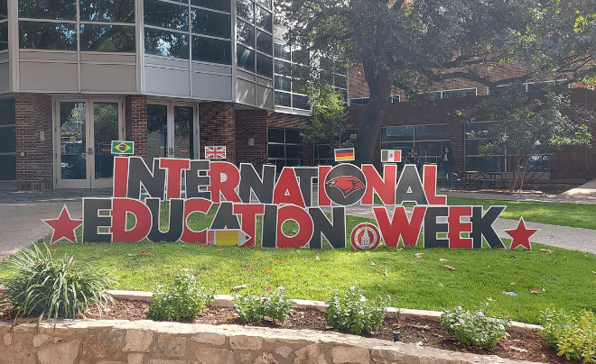 International Education Week sign in front of the library