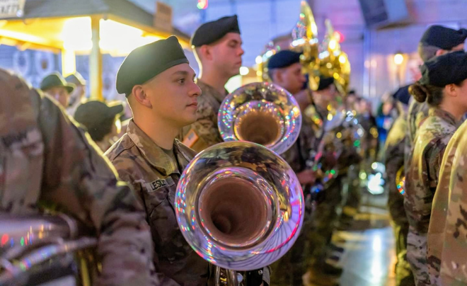 Lesley standing at attention with his euphonium