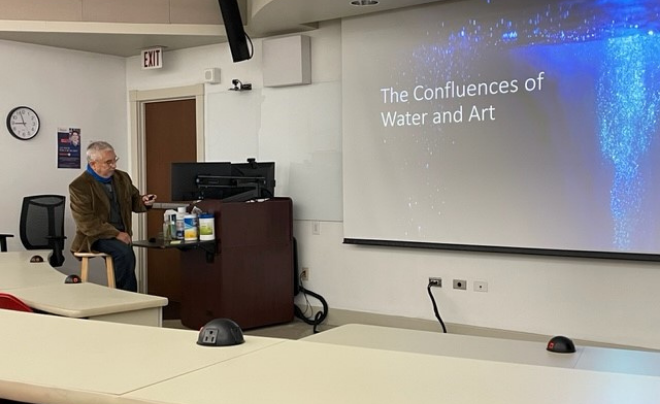 Miguel Cortinas presents on water and art for the students